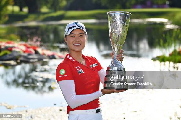 Tournament winner Minjee Lee of Australia poses for a photo with her trophy during day four of the The Amundi Evian Championship at Evian Resort Golf...