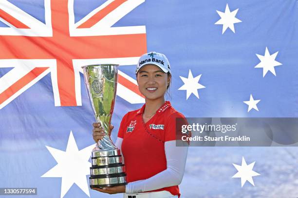 Tournament winner Minjee Lee of Australia poses for a photo with her trophy during day four of the The Amundi Evian Championship at Evian Resort Golf...