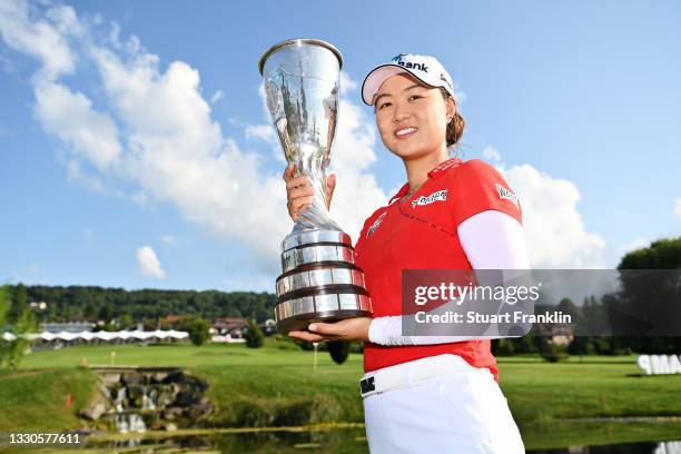 Tournament winner Minjee Lee of Australia poses for a photo with her trophy during day four of the The Amundi Evian Championship at Evian Resort Golf...