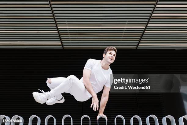 70 Man Jumping Over Railing Stock Photos, High-Res Pictures, and Images ...