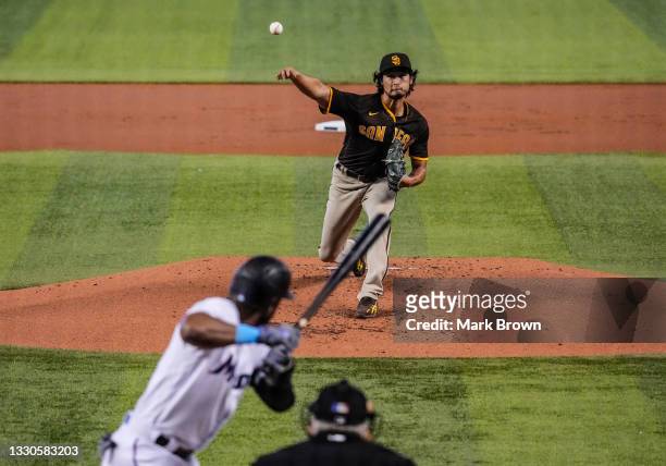 Yu Darvish of the San Diego Padres delivers a pitch to Starling Marte of the Miami Marlins in the first inning at loanDepot park on July 25, 2021 in...