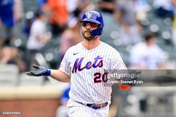Pete Alonso of the New York Mets celebrates after hitting a two-run home run against the Toronto Blue Jays during the sixth inning at Citi Field on...