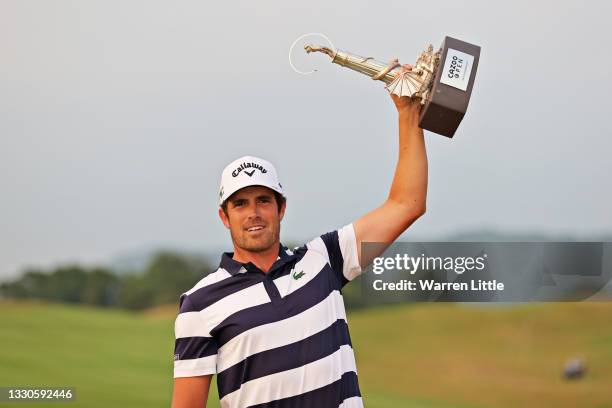 Tournament winner Nacho Elvira of Spain poses for a photo with his trophy during Day Four of the Cazoo Open supported by Gareth Bale at Celtic Manor...