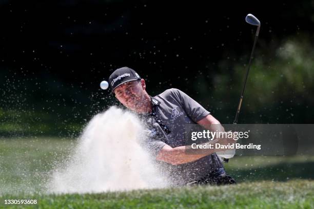 Jimmy Walker plays his shot from the bunker on the first hole during the final round of the 3M Open at TPC Twin Cities on July 25, 2021 in Blaine,...