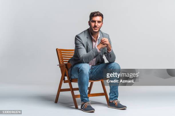 confident young adult caucasian businessman - portrait solid stock pictures, royalty-free photos & images