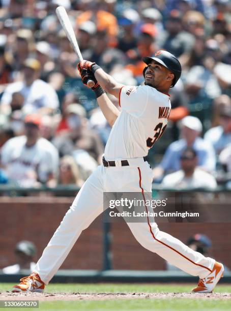 LaMonte Wade Jr of the San Francisco Giants hits a double in the bottom of the fifth inning against the Pittsburgh Pirates at Oracle Park on July 25,...