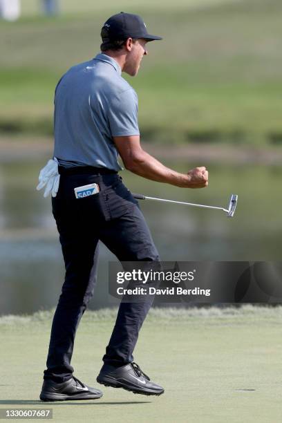 Cameron Champ reacts after making par on the 18th green to finish his round during the final round of the 3M Open at TPC Twin Cities on July 25, 2021...