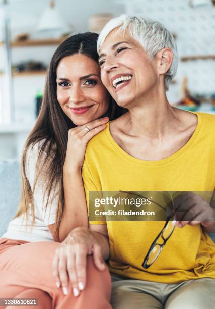mother and daughter - beautiful grandmothers stock pictures, royalty-free photos & images