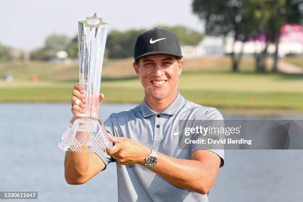 Cameron Champ poses with the trophy after winning the 3M Open at TPC Twin Cities on July 25, 2021 in Blaine, Minnesota.