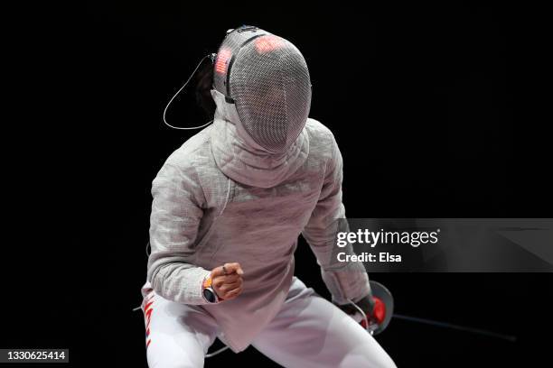 Jiyeon Kim of Team South Korea celebrates a point against Nada Hafez of Team Egypt in Women's Sabre Individual second round on day three of the Tokyo...