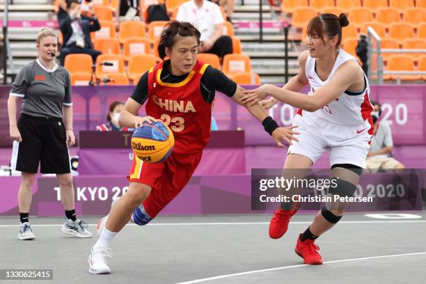 Lili Wang of Team China handles the ball on day three of the Tokyo 2020 Olympic Games at Aomi Urban Sports Park on July 26, 2021 in Tokyo, Japan.