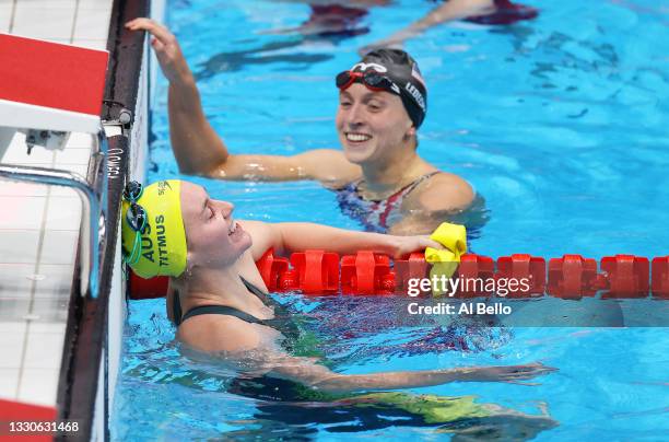 Ariarne Titmus of Team Australia and Katie Ledecky of Team United States react after competing in the Women's 400m Freestyle Final on day three of...