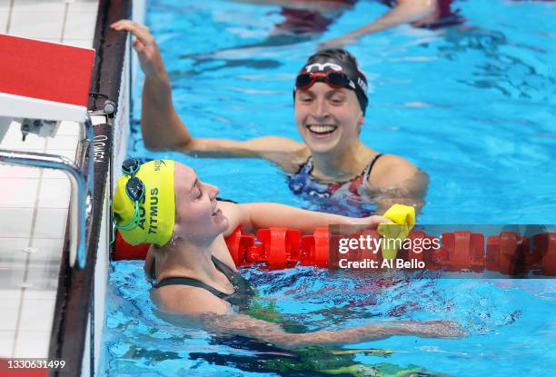 Ariarne Titmus of Team Australia and Katie Ledecky of Team United States react after competing in the Women's 400m Freestyle Final on day three of...