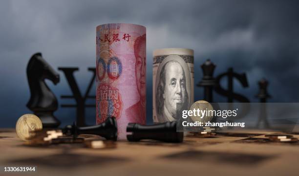 rmb and us dollar bank notes concept business background - divisa china fotografías e imágenes de stock