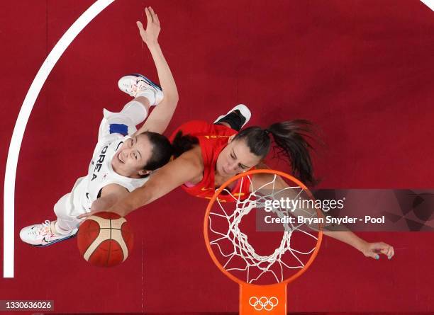Raquel Carrera Quintana of Team Spain and Hyejin Park of Team South Korea battle for a rebound on day three of the Tokyo 2020 Olympic Games at...