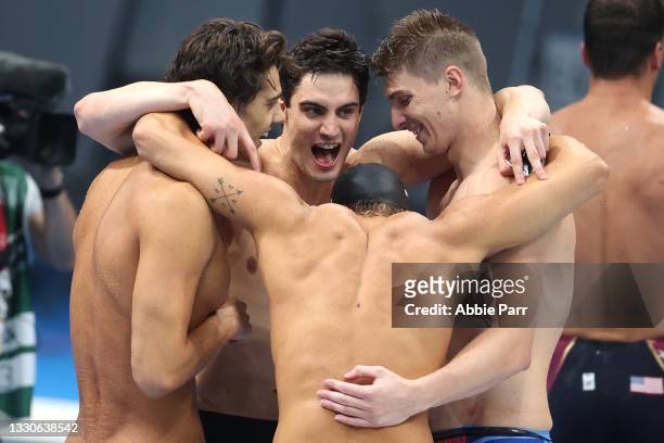 Alessandro Miressi, Thomas Cecon, Lorenzo Zazzeri and Manuel Frigo of Team Italy celebrate after winning silver in the Men's 4X100 meter freestyle...