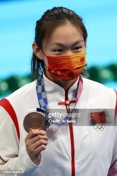 Bingjie Li of Team China poses with the bronze medal for the Women's 400m Freestyle Final on day three of the Tokyo 2020 Olympic Games at Tokyo...