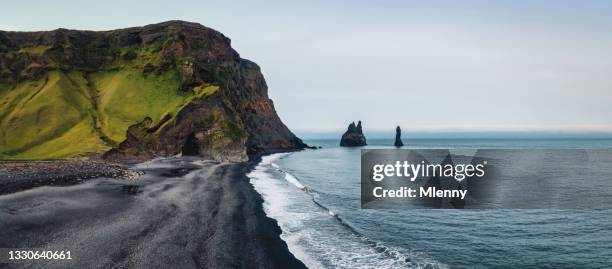 iceland rynisfjara black sand lava beach panorama reynisdrangar vik i myrdal - iceland stock pictures, royalty-free photos & images