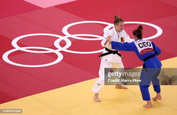 Theresa Stoll of Team Germany and Lasha Shavdatuashvili of Team Georgia compete during the Women’s Judo 57kg Elimination Round 16 on day three of the...