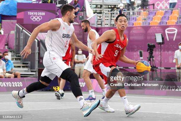 Tomoya Ochiai of Team Japan handles the ball on day three of the Tokyo 2020 Olympic Games at Aomi Urban Sports Park on July 26, 2021 in Tokyo, Japan.