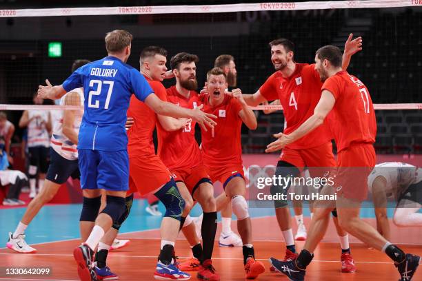 Team ROC celebrates against Team United States during the Men's Preliminary Round - Pool B volleyball on day three of the Tokyo 2020 Olympic Games at...