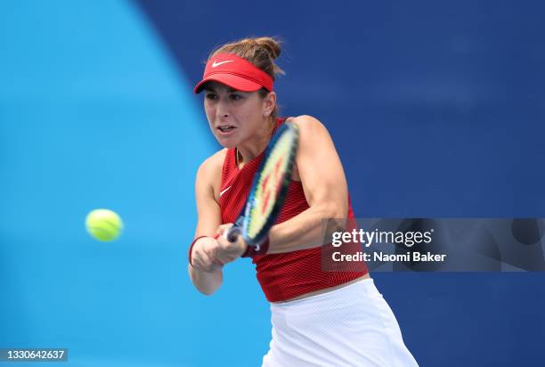 Belinda Bencic of Team Switzerland plays a backhand during her Women's Singles Second Round match against Misaki Doi of Team Japan on day three of...