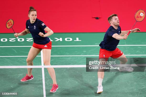 Lauren Smith and Marcus Ellis of Team Great Britain compete against Dechapol Puavaranukroh and Sapsiree Taerattanachai of Team Thailand during a...