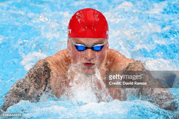 Adam Peaty of Team Great Britain competes in the Men's 100m Breaststroke Final on day three of the Tokyo 2020 Olympic Games at Tokyo Aquatics Centre...