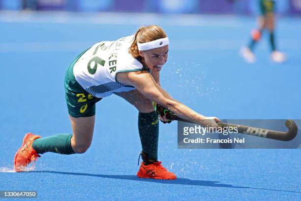 Emily Chalker of Team Australia attempts a shot against Team China during the Women's Preliminary Pool B match on day three of the Tokyo 2020 Olympic...