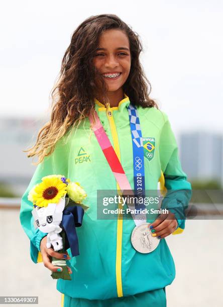 Rayssa Leal of Team Brazil poses with her silver medal during the Women's Street Final medal ceremony on day three of the Tokyo 2020 Olympic Games at...