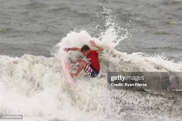 Kolohe Andino of Team United States surfs during the men's round 3 heat on day three of the Tokyo 2020 Olympic Games at Tsurigasaki Surfing Beach on...