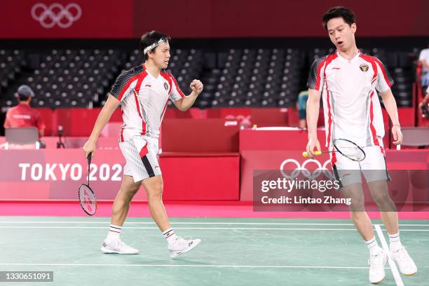 Marcus Fernaldi Gideon and Kevin Sanjaya Sukamuljo of Team Indonesia react as they compete against Satwiksairaj Rankireddy and Chirag Shetty of Team...