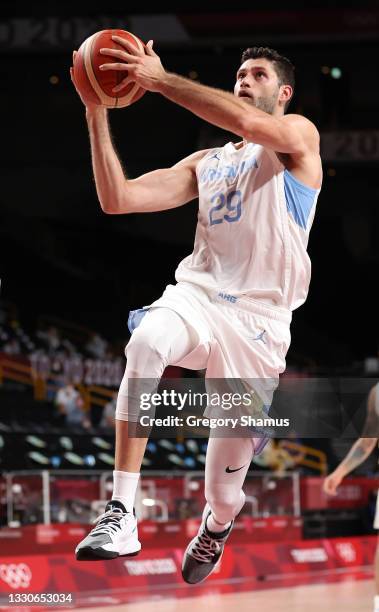 Patricio Garino of Team Argentina goes up for a shot against Slovenia during the first half on day three of the Tokyo 2020 Olympic Games at Saitama...