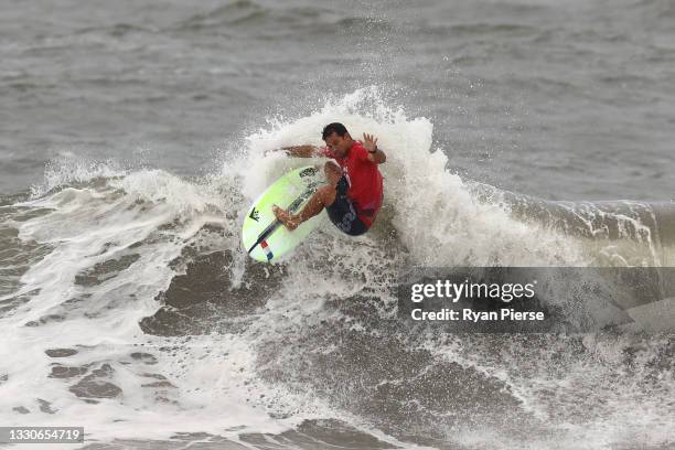 Michel Bourez of Team France surfs during the men's round 3 heat on day three of the Tokyo 2020 Olympic Games at Tsurigasaki Surfing Beach on July...