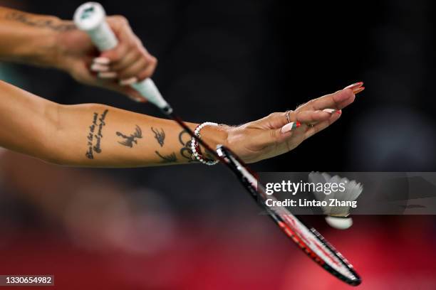 Picture shows Gabriela Stoeva's tattoo and fingernails as she serves during a Women’s Doubles Group D match between Gabriela Stoeva and Stefani...