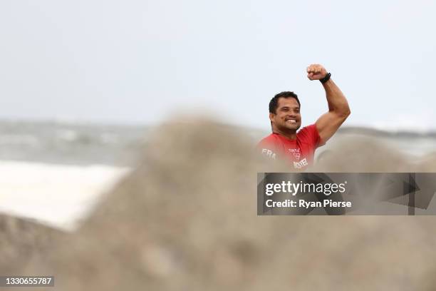 Michel Bourez of Team France reacts after his win in the men's round 3 heat on day three of the Tokyo 2020 Olympic Games at Tsurigasaki Surfing Beach...