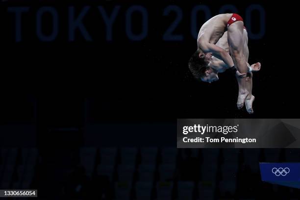 Nathan Zsombor-Murray and Vincent Riendeau of Team Canada compete during the Men's Synchronised 10m Platform Final on day three of the Tokyo 2020...