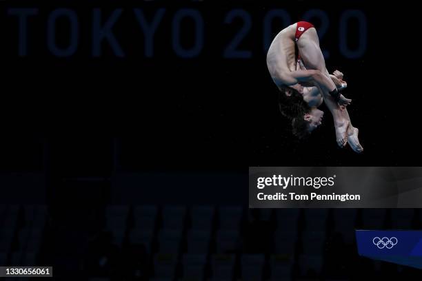 Nathan Zsombor-Murray and Vincent Riendeau of Team Canada compete during the Men's Synchronised 10m Platform Final on day three of the Tokyo 2020...