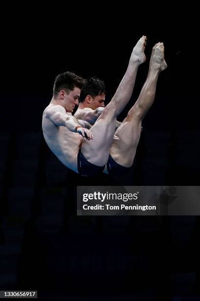 Matty Lee and Thomas Daley of Team Great Britain compete during the Men's Synchronised 10m Platform Final on day three of the Tokyo 2020 Olympic...