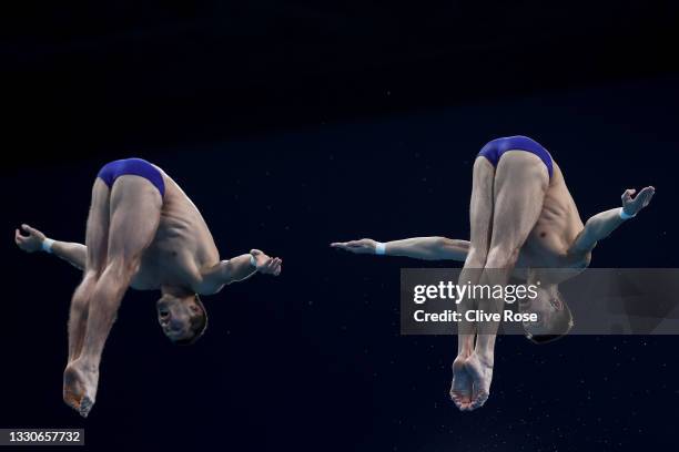 Aleksandr Bondar and Viktor Minibaev of Team ROC compete during the Men's Synchronised 10m Platform Final on day three of the Tokyo 2020 Olympic...