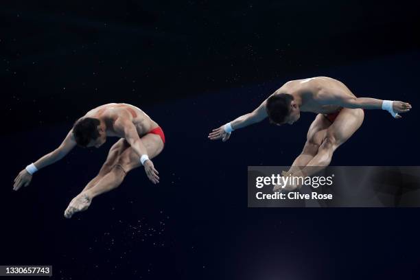 Yuan Cao and Aisen Chen of Team China compete during the Men's Synchronised 10m Platform Final on day three of the Tokyo 2020 Olympic Games at Tokyo...