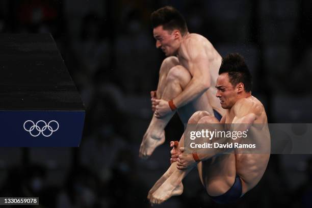 Matty Lee and Thomas Daley of Team Great Britain compete during the Men's Synchronised 10m Platform Final on day three of the Tokyo 2020 Olympic...