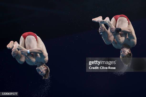 Nathan Zsombor-Murray and Vincent Riendeau of Team Canada compete during the Men's Synchronised 10m Platform Final on day three of the Tokyo 2020...