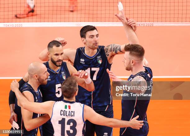 Team Italy celebrates against Team Poland during the Men's Preliminary Round - Pool A volleyball on day three of the Tokyo 2020 Olympic Games at...