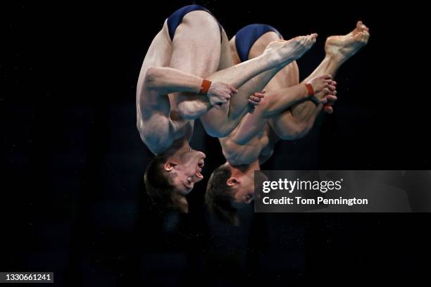 Tom Daley and Matty Lee of Team Great Britain compete during the Men's Synchronised 10m Platform Final on day three of the Tokyo 2020 Olympic Games...