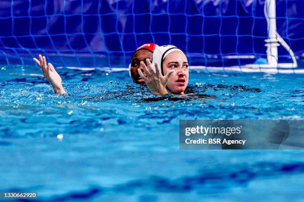 Ashleigh Johnson of United States, Margaret Steffens of United States injured, bleeding nose during the Tokyo 2020 Olympic Waterpolo Tournament Women...