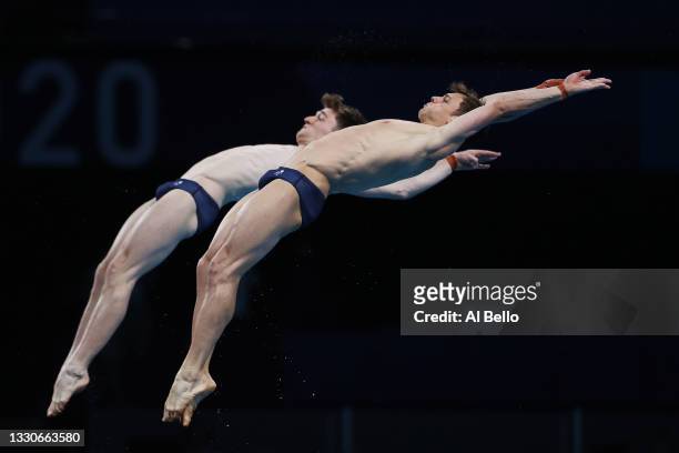 Tom Daley and Matty Lee of Team Great Britain compete during the Men's Synchronised 10m Platform Final on day three of the Tokyo 2020 Olympic Games...
