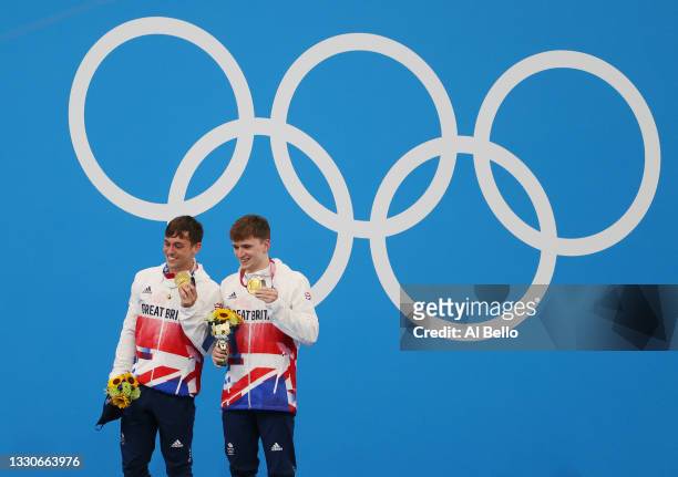 Matty Lee and Thomas Daley of Team Great Britain pose with their gold medals during the medal presentation for the Men's Synchronised 10m Platform...