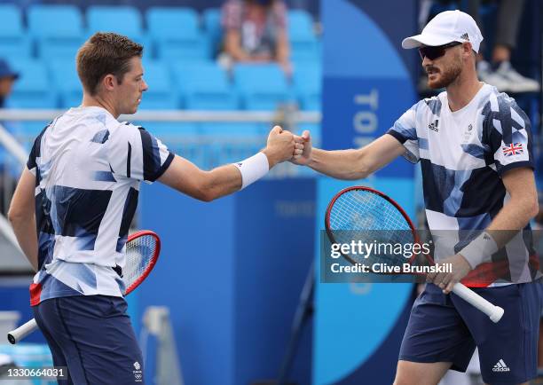 Jamie Murray of Team Great Britain and Neal Skupski of Team Great Britain play Kei Nishikori of Team Japan and Ben McLachlan of Team Japan in their...