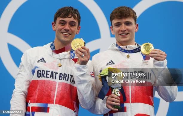 Matty Lee and Thomas Daley of Team Great Britain pose with their gold medals during the medal presentation for the Men's Synchronised 10m Platform...